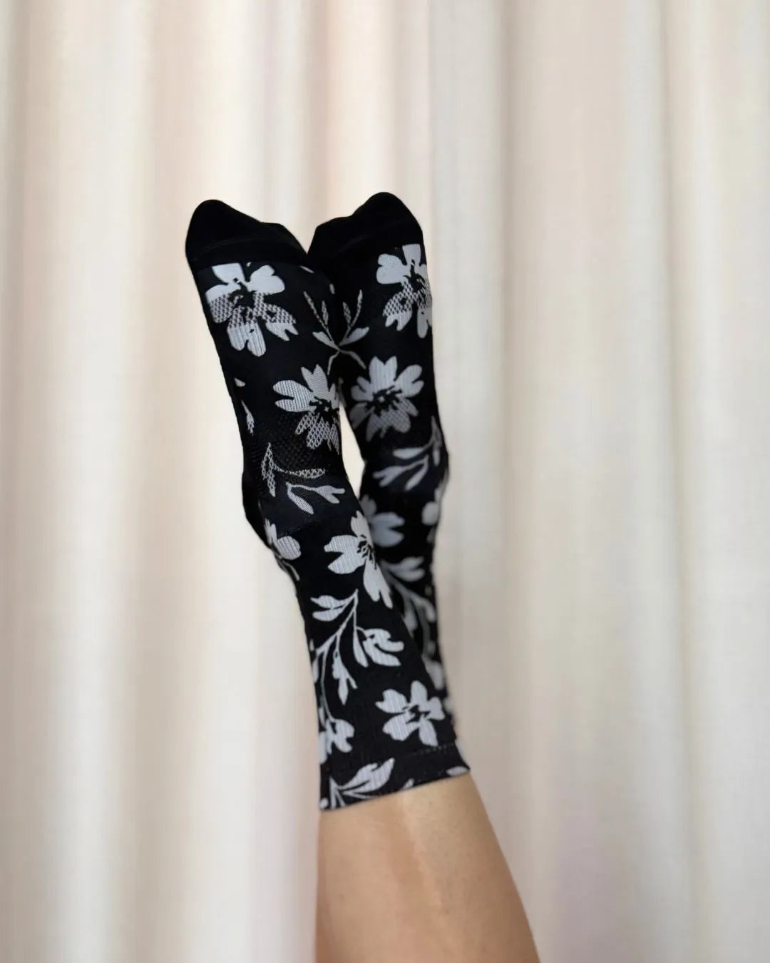 blackfloralmazecyclingsocks_775b8dda-a625-4d5b-8c6a-dab52d487926.webp
