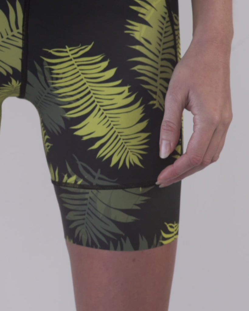 Demonstration of of high waist, and leg bands on Samsara Forest Fern cycling shorts.