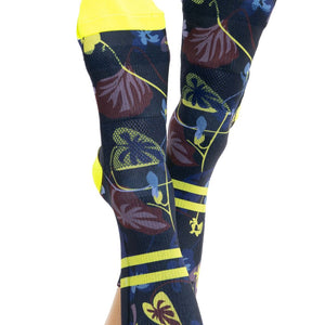 Top view of women’s cycling socks with Winter Floral print, yellow ankle stripes, and toes.